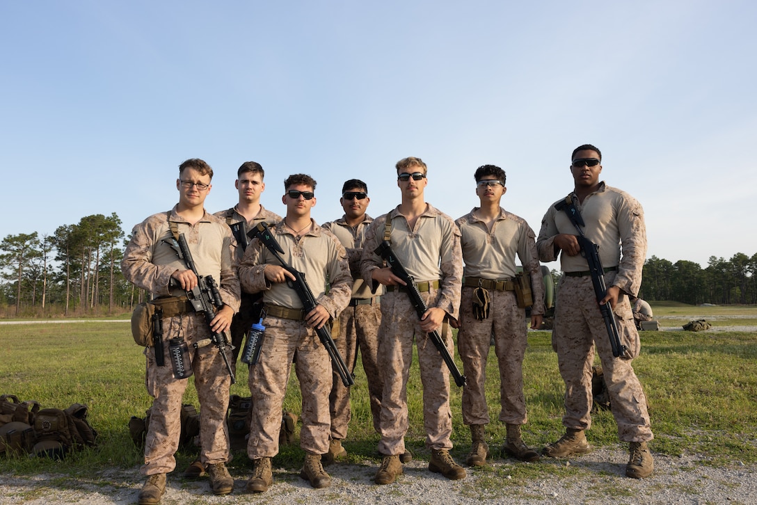 U.S. Marines with Bravo Battery, 2nd Low Altitude Air Defense (LAAD) Battalion, pose for a photo following a counter-unmanned aircraft system (UAS) range on Marine Corps Base Camp Lejeune, North Carolina, April 16, 2024. 2nd LAAD Battalion conducted a dynamic tactical scenario-driven counter-UAS aerial-gunnery range in which Marines had to shoot, maneuver, and communicate while directly engaging UAS aircraft. (U.S. Marine Corps photo by Lance Cpl. Anakin Smith)