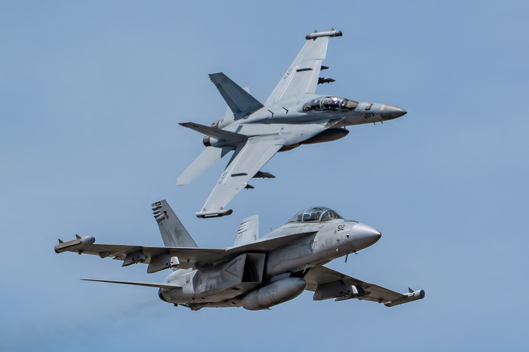 The U.S. Navy’s EA-18G Growler Demonstration Team, from Naval Air Station Whidby Island, Wash., performs an aerobatic display during the Thunder Over Louisville air show in Louisville, Ky., April 20, 2024. This year’s event featured more than two-dozen military and civilian aircraft, including the Kentucky Air National Guard’s C130J Super Hercules. (U.S. Air National Guard photo by Dale Greer)