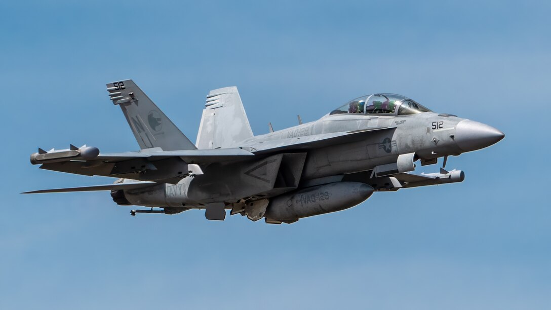 A U.S. Navy EA-18G Growler from Naval Air Station Whidby Island, Wash., performs an aerobatic display during the Thunder Over Louisville air show in Louisville, Ky., April 20, 2024. This year’s event featured more than two-dozen military and civilian aircraft, including the Kentucky Air National Guard’s C130J Super Hercules. (U.S. Air National Guard photo by Dale Greer)