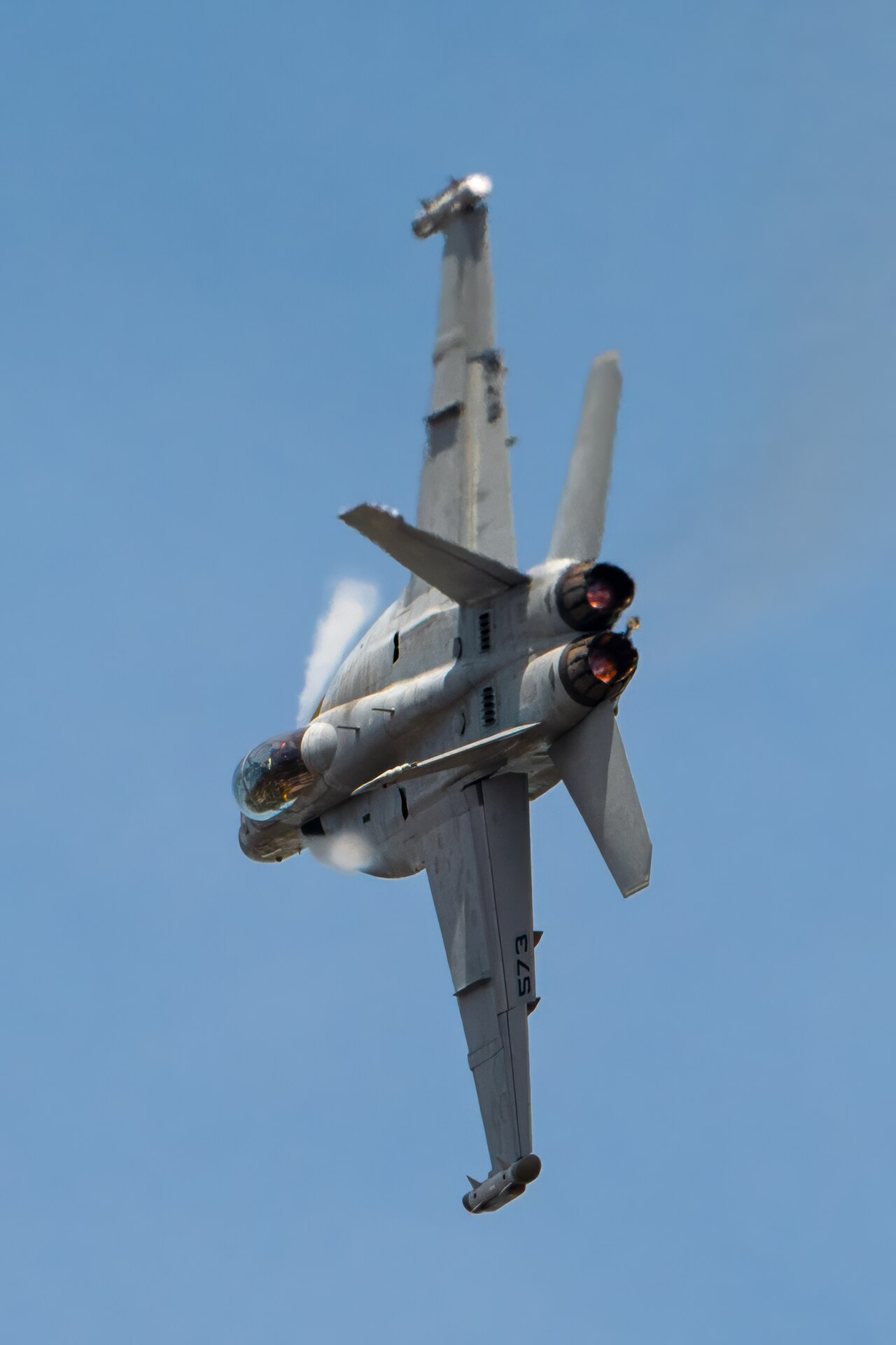 A U.S. Navy EA-18G Growler from Naval Air Station Whidby Island, Wash., performs an aerobatic display during the Thunder Over Louisville air show in Louisville, Ky., April 20, 2024. This year’s event featured more than two-dozen military and civilian aircraft, including the Kentucky Air National Guard’s C130J Super Hercules. (U.S. Air National Guard photo by Dale Greer)