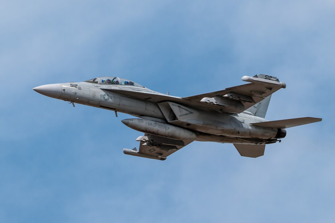 A U.S. Navy EA-18G Growler from Naval Air Station Whidby Island, Wash., performs an aerobatic display during the Thunder Over Louisville air show in Louisville, Ky., April 20, 2024. This year’s event featured more than two-dozen military and civilian aircraft, including the Kentucky Air National Guard’s C130J Super Hercules. (U.S. Air National Guard photo by Dale Greer)