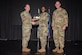 The 51st Fighter Wing command team presents the Company Grade Officer of the Quarter award to Capt. Amina Lynch, 51st Force Support Squadron sustainment services flight commander, during the 51st FW quarterly awards ceremony at Osan Air Base, Republic of Korea, April 19, 2024. 51st FW leadership regularly acknowledges outstanding performers, expressing appreciation for their contributions to the 
