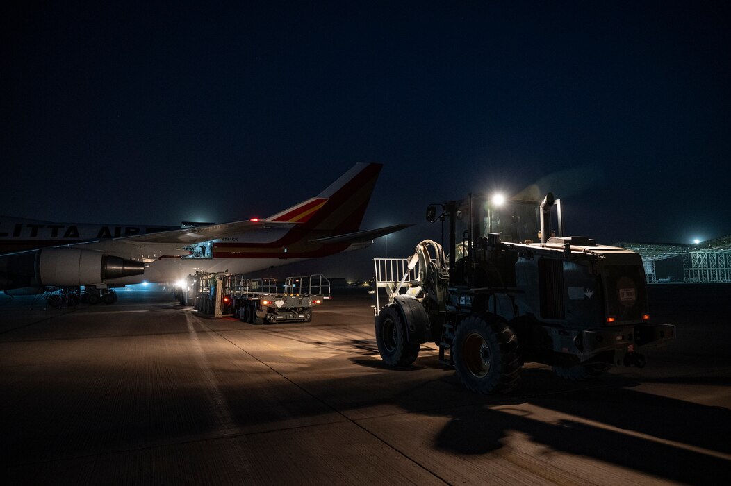 U.S. Air Force port operations Airmen prepare to offload a Boeing 747 at an undisclosed location, U.S. Central Command Area of Responsibility, April 22, 2024. The Department of the Air Force will continue to partner with Allies and industry to overcome logistics challenges because interoperability improves operational resilience. (U.S. Air Force photo)