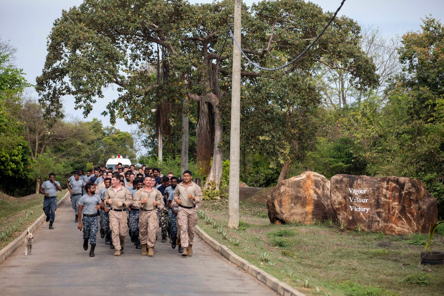 U.S. Marines assigned to Fleet Anti-Terrorism Security Team Pacific and members of the Sri Lanka Navy (SLN) take part in a formation run as part of exercise Cooperation Afloat Readiness and Training (CARAT) Sri Lanka 2024 at SLNS Vidura, April 23. CARAT Sri Lanka is a bilateral exercise between Sri Lanka and the United States designed to promote regional security cooperation and strengthen maritime understanding, partnerships, and interoperability. In its 29th year, the CARAT series is comprised of multinational exercises, designed to enhance U.S. and partner forces’ abilities to operate together in response to traditional and non-traditional maritime security challenges in the Indo-Pacific region. (U.S. Navy photo by Mass Communication Specialist 1st Class Charles Oki)