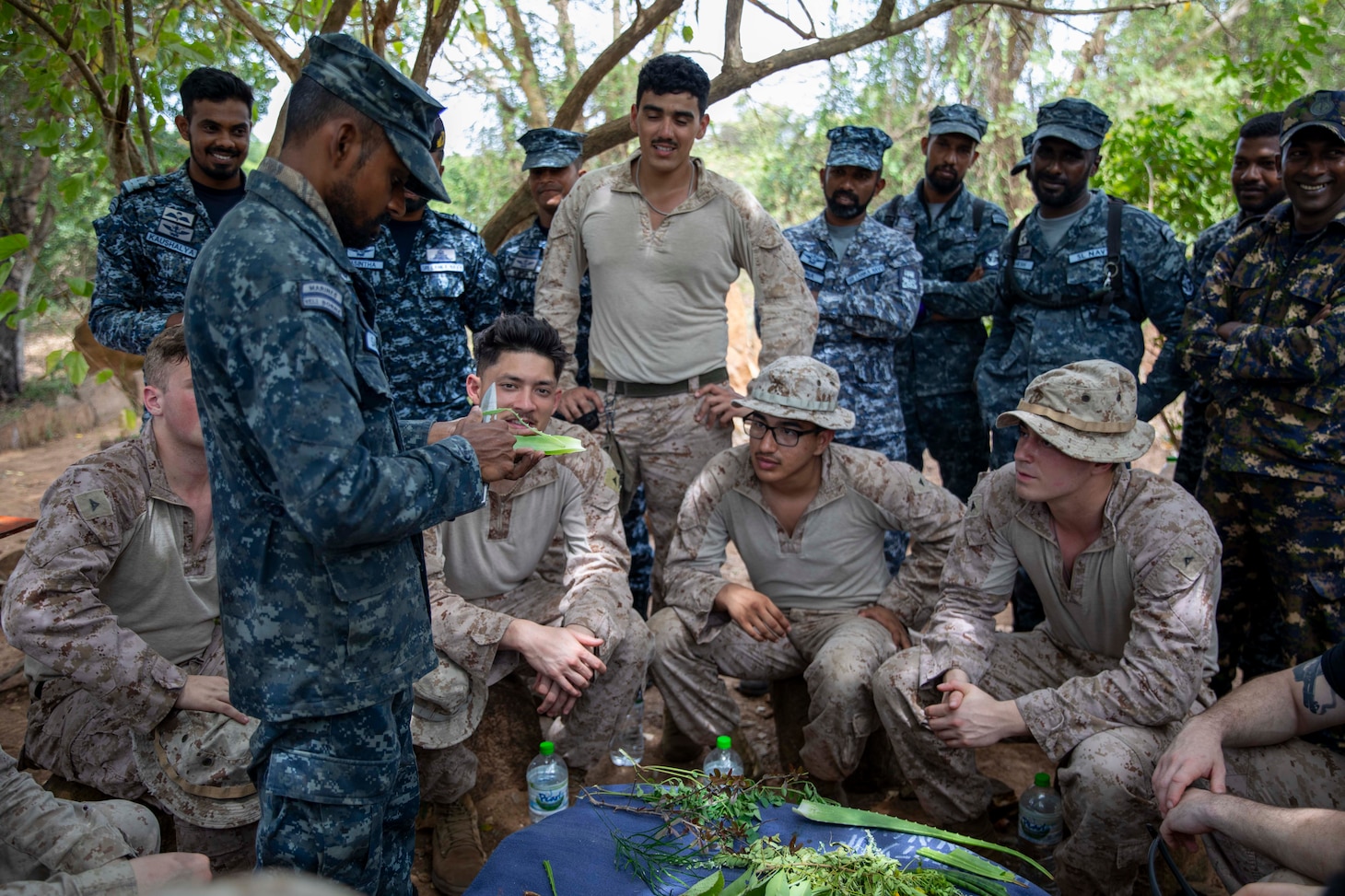 A member of the Sri Lanka Navy (SLN) teaches U.S. Marines assigned to Fleet Anti-Terrorism Security Team Pacific how use medicinal plants as part of exercise Cooperation Afloat Readiness and Training (CARAT) Sri Lanka 2024 at SLNS Vidura, April 23. CARAT Sri Lanka is a bilateral exercise between Sri Lanka and the United States designed to promote regional security cooperation and strengthen maritime understanding, partnerships, and interoperability. In its 29th year, the CARAT series is comprised of multinational exercises, designed to enhance U.S. and partner forces’ abilities to operate together in response to traditional and non-traditional maritime security challenges in the Indo-Pacific region. (U.S. Navy photo by Mass Communication Specialist 1st Class Charles Oki)