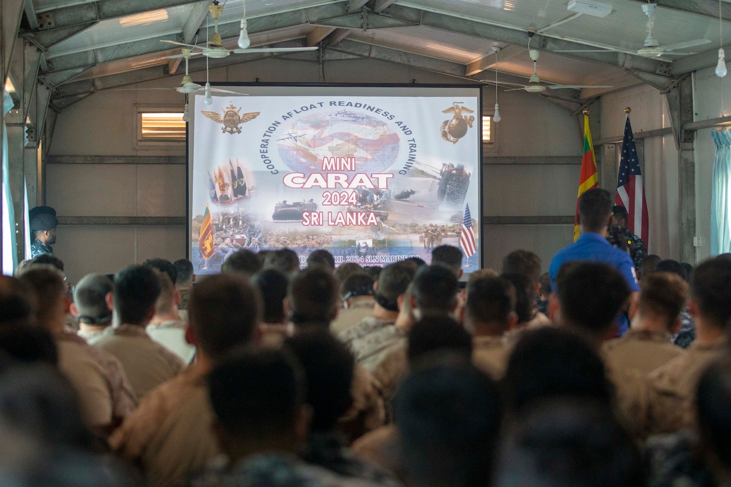 U.S. Marines assigned Fleet Anti-Terrorism Security Team Pacific and Marines of the Sri Lankan Navy attend an opening ceremony to mark the beginning of exercise Cooperation Afloat Readiness and Training (CARAT) Sri Lanka 2024 at SLNS Vidura, April 22. CARAT Sri Lanka is a bilateral exercise between Sri Lanka and the United States designed to promote regional security cooperation and strengthen maritime understanding, partnerships, and interoperability. In its 29th year, the CARAT series is comprised of multinational exercises, designed to enhance U.S. and partner forces’ abilities to operate together in response to traditional and non-traditional maritime security challenges in the Indo-Pacific region. (U.S. Navy photo by Mass Communication Specialist 1st Class Charles Oki)