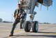 U.S. Air Force Capt. Joshua Cover, 9th Expeditionary Bomb Squadron weapons system officer, poses for a photo on the ladder of a B-1B Lancer assigned to Dyess Air Force Base, Texas, at Morón Air Base, Spain, during Bomber Task Force Europe April 22, 2024. Cover began his career at Dyess as an enlisted electronic warfare specialist, later commissioning to become a WSO. He is currently on the BTF using his knowledge to contribute to the 9th EBS’s global deterrence mission. (U.S. Air Force photo by Airman 1st Class Emma Anderson)