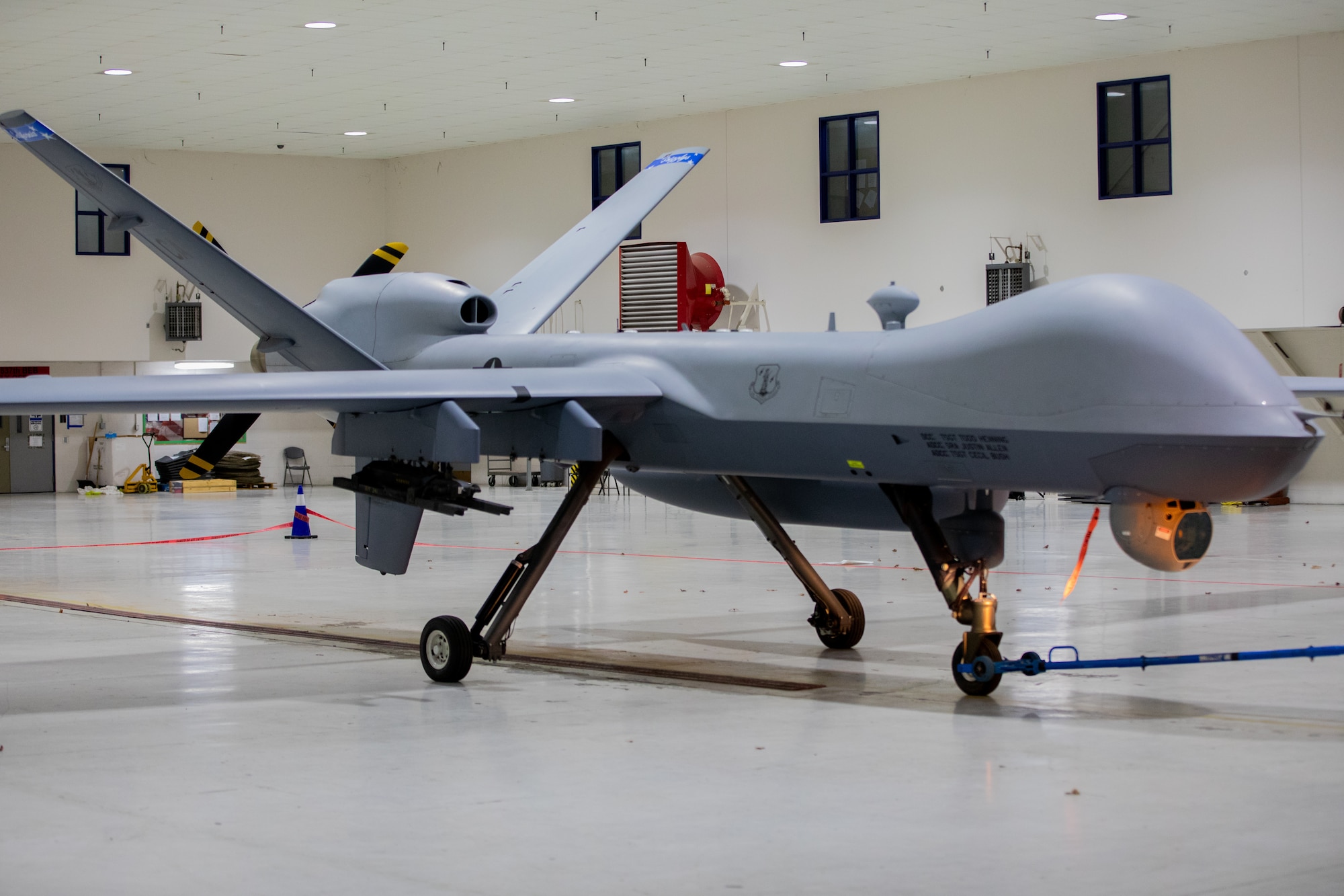 A remotely piloted MQ-9 Reaper from the 163rd Attack Wing sits in a 178th Wing hanger on Springfield-Beckley Air National Guard Base, Ohio, March 12, 2024. Exercise Advanced Wrath gives the 178th Wing an opportunity to support an MQ-9 Reaper locally with airmen from across the country. (U.S. Army National Guard photo by Staff Sgt. Thomas Moeger)