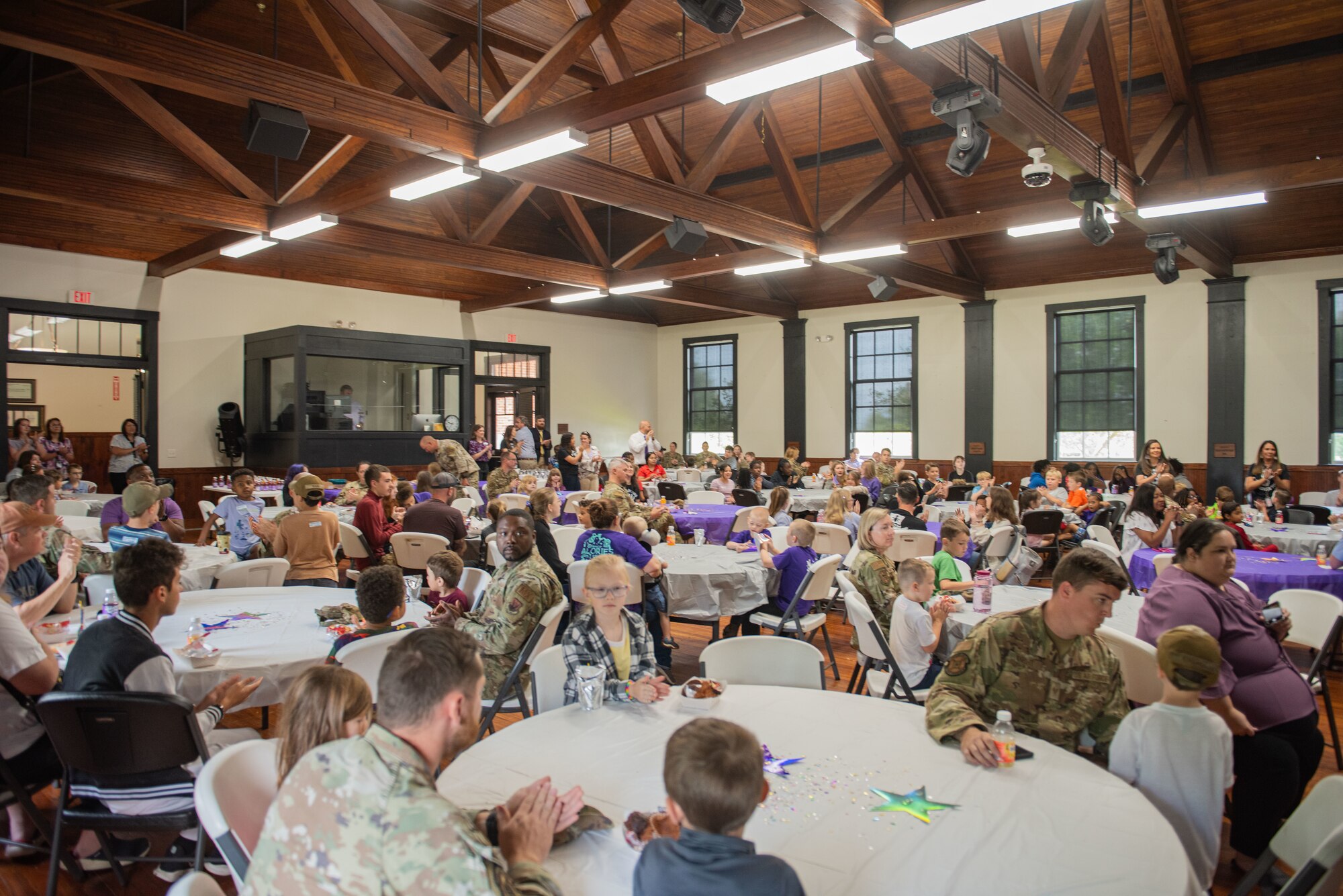 U.S. Airmen and students attend a Flagship School Award Ceremony