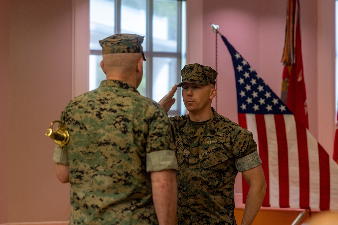 U.S. Marine Corps Sgt. Maj. Christopher Taylor (right) accepts responsibilities as Sergeant Major of the 26th MEU(SOC) during a relief and appointment ceremony at Marine Corps Base Camp Lejeune, North Carolina, Apr. 19, 2024. The relief and appointment ceremony serves as the official changeover between Sergeants Major, honoring the outgoing Sergeant’s Major contributions during his tenure and allowing the oncoming SgtMaj to introduce himself to the Marines now under his charge. (U.S. Marine Corps photo by Sgt. Nayelly Nieves-Nieves)