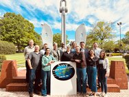 Yeoman Chief Petty Officer Christina Rodriguez (second from left), Vice Admiral Johnny R. Wolfe Jr, (third from right), and members of Strategic Systems Programs (SSP) participate in Denim Day to raise awareness for and promote prevention of sexual violence, as well as to support survivors of sexual assault and harassment. Wearing denim on the last Wednesday of April has been a tradition since Denim Day originated in 1999 when the Italian Supreme Court overturned a rape conviction, stating that the victim’s attire when she was attacked – denim jeans – implied consent. The following day, women in the Italian Parliament stood in solidarity with the victim--and with victims around the globe--by wearing denim in protest of the ruling. (U.S. Navy photo by LT Jennifer Bowman/Released)