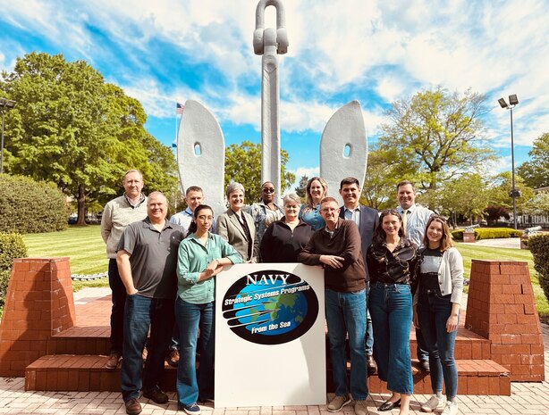 Yeoman Chief Petty Officer Christina Rodriguez (second from left), Vice Admiral Johnny R. Wolfe Jr, (third from right), and members of Strategic Systems Programs (SSP) participate in Denim Day to raise awareness for and promote prevention of sexual violence, as well as to support survivors of sexual assault and harassment. Wearing denim on the last Wednesday of April has been a tradition since Denim Day originated in 1999 when the Italian Supreme Court overturned a rape conviction, stating that the victim’s attire when she was attacked – denim jeans – implied consent. The following day, women in the Italian Parliament stood in solidarity with the victim--and with victims around the globe--by wearing denim in protest of the ruling. (U.S. Navy photo by LT Jennifer Bowman/Released)