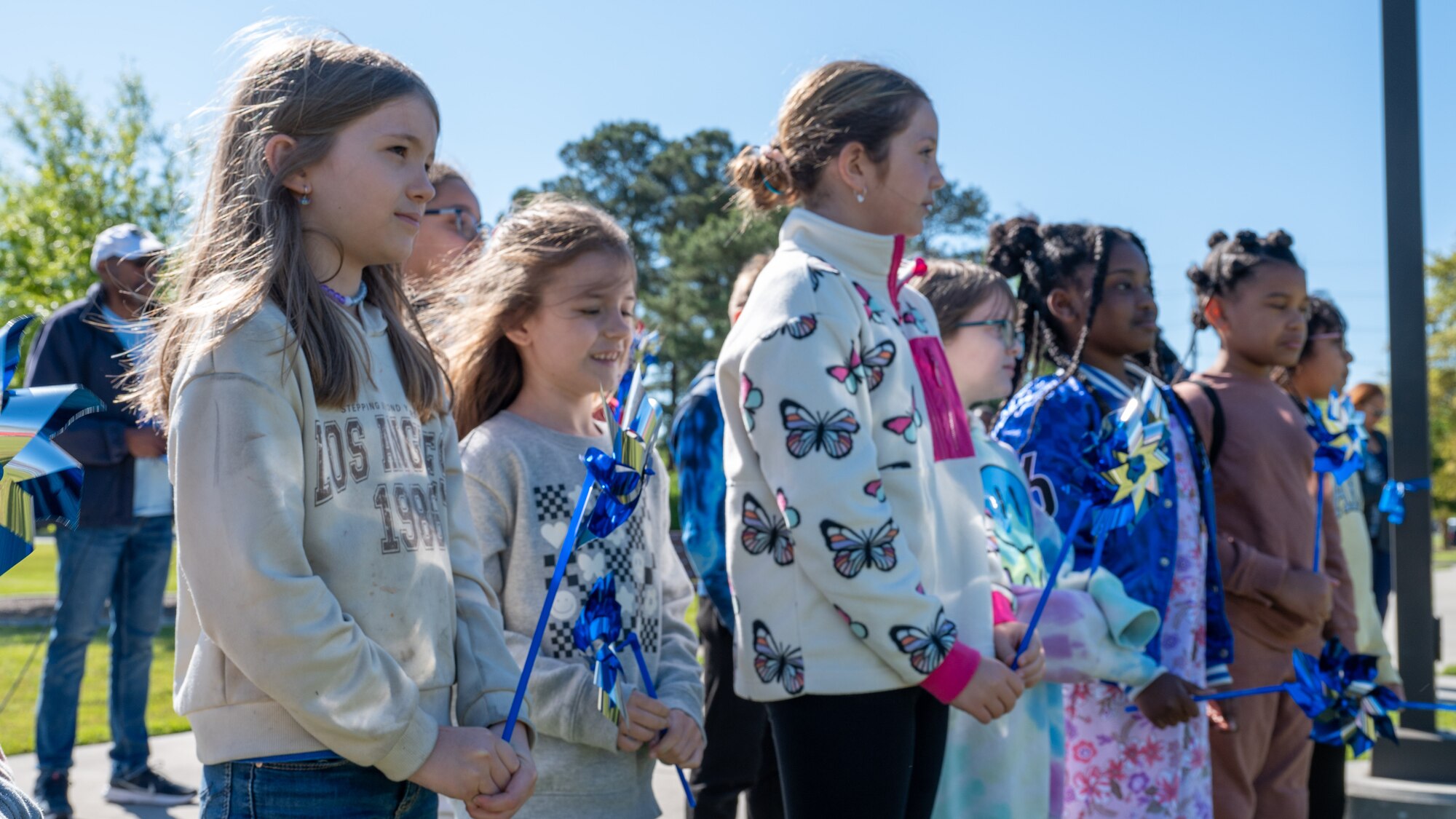 Children of the Seymour Johnson Child Development Center participate in a “Pinwheels for Child Abuse Prevention” at Seymour Johnson Air Force Base, North Carolina, Apr. 4, 2024. The event promoted the importance of healthy family dynamics. (U.S. Air Force Photo by Airman Rebecca Tierney)