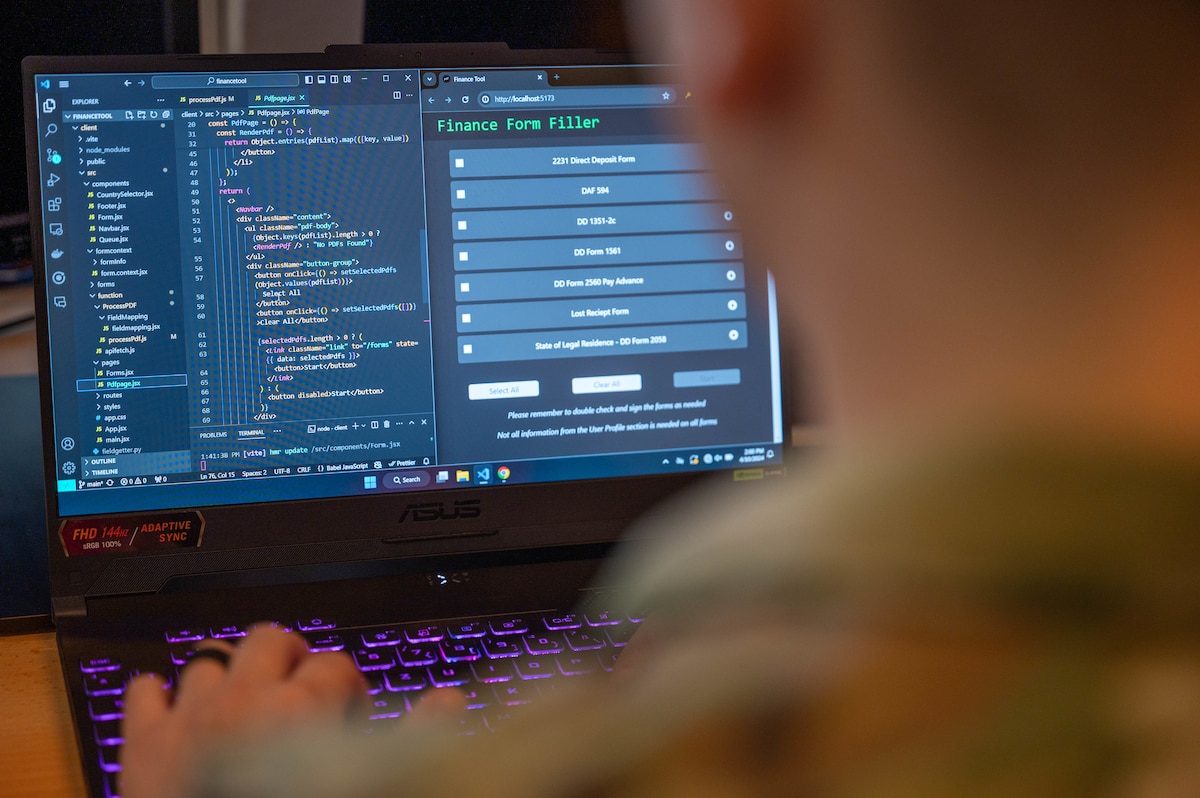 U.S. Air Force Senior Airman Brandon Freeman, Project Arc computer scientist, works on additional coding for a financial tool to be tested by Ramstein Air Base at Kapaun Air Station, Germany, April 9, 2024. This tool aims to enhance myFSS capabilities where users can upload and share documents in need of signatures, while tracking where it is in the routing process—aiding in overall improved quality of life for Airmen and their families. (U.S. Air Force photo by Senior Airman Jordan Lazaro)