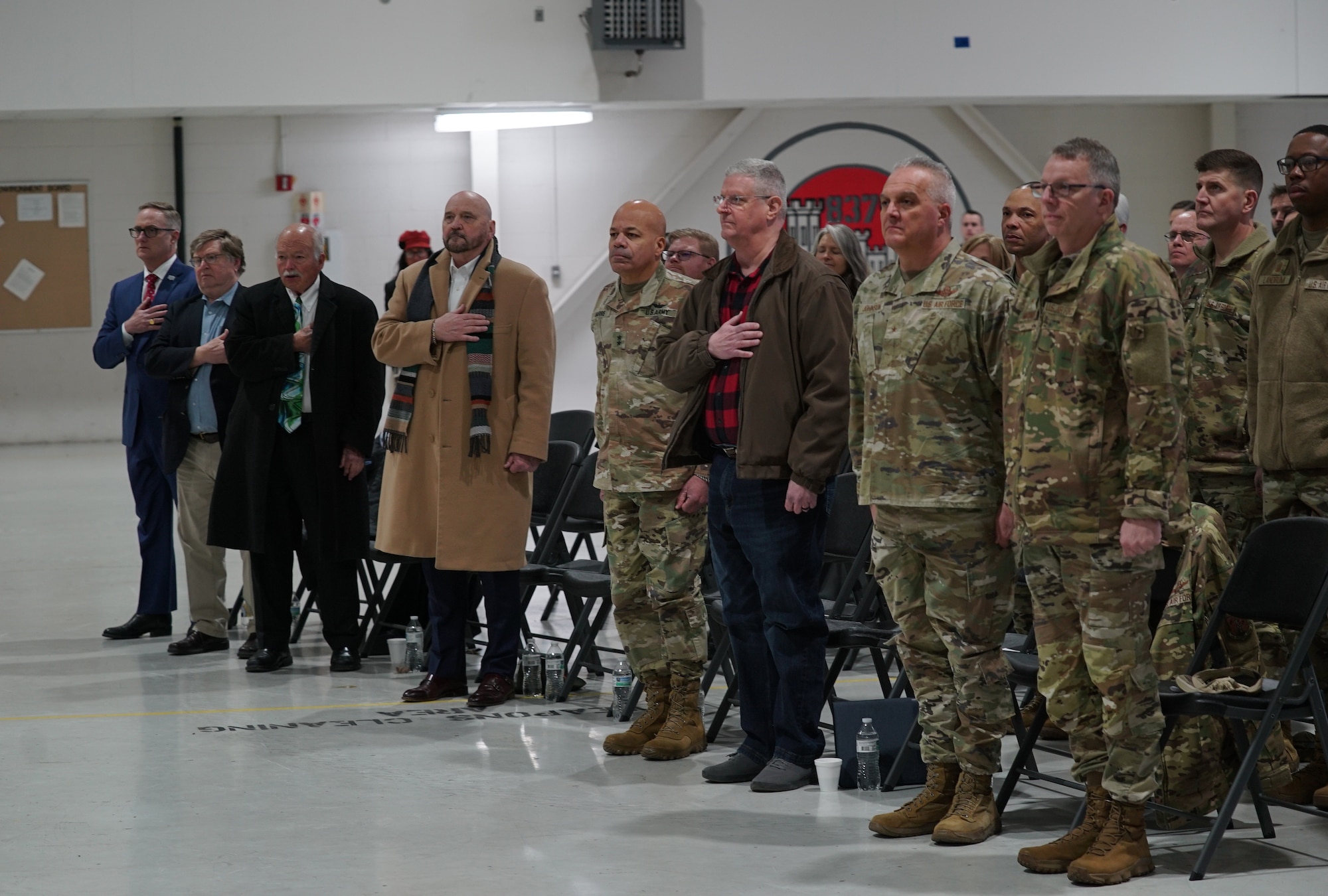 State officials, military leaders, and other community members gather for a presentation on the current capabilities and mission of the 178th Wing at Springfield-Beckley Air National Guard Base, Ohio, March 18, 2024. Airmen assigned to the 178th Wing recently completed a historic landing of the MQ-9 Reaper using auto take-off and land technology. (U.S. Air National Guard photo by Staff Sgt. Jillian Maynus)