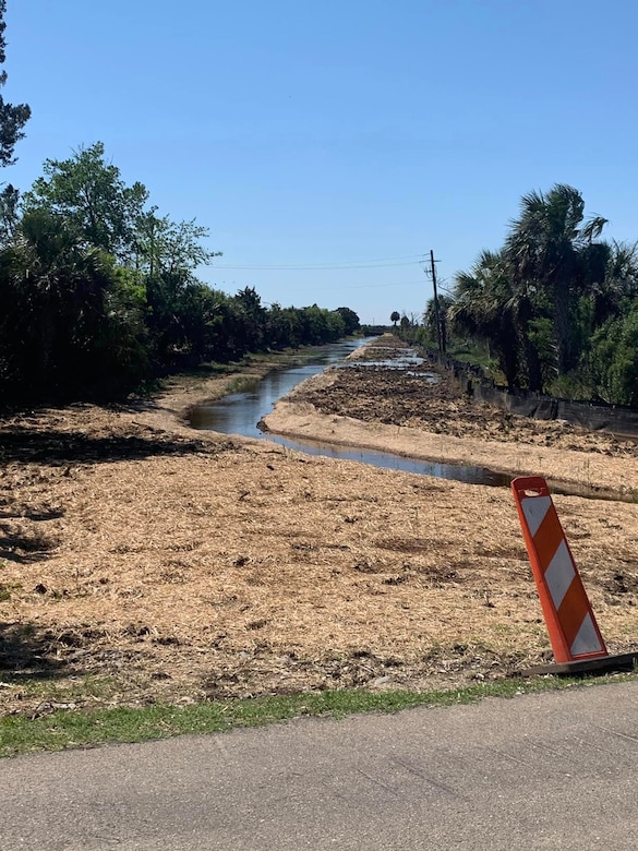 The U.S. Army Corps of Engineers, Savannah District, has removed overgrowth of trees and plants as well as excess sediment from Ditch No. 5, shown here. This ditch is a part of the island’s drainage system designed to efficiently channel excess water away from vulnerable areas, preventing flooding, saltwater intrusion, water stagnation and minimizing soil erosion. This is shown at the park’s entrance road.