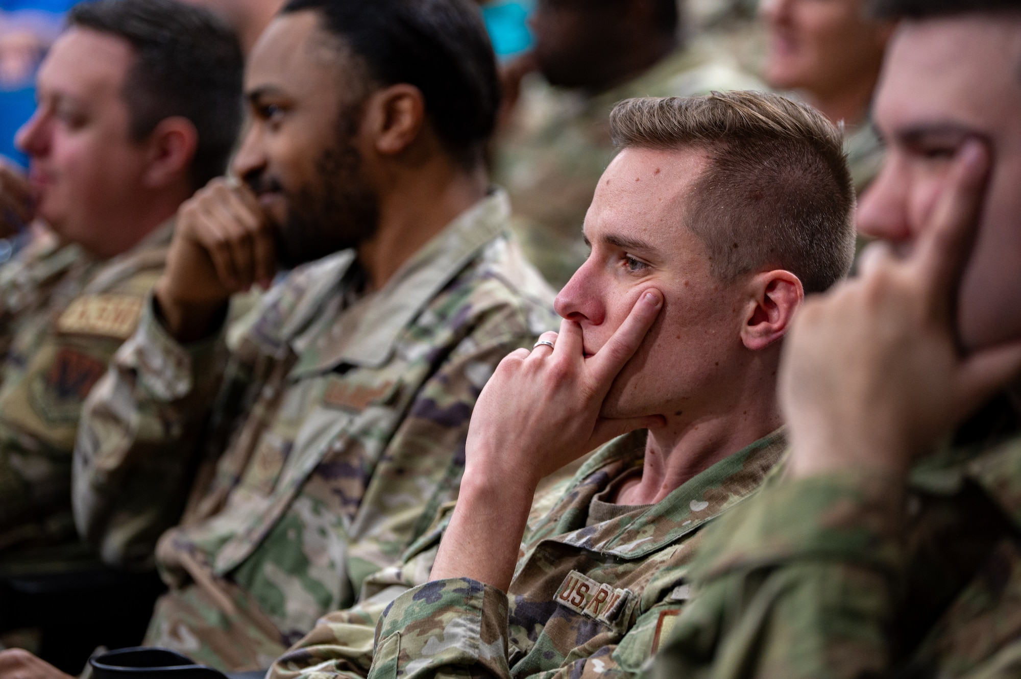 Airmen listen to a sapr brief