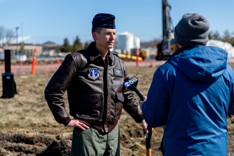 Col. Charles Merkel, commander of the 128th Air Refueling Wing, General Mitchell Air National Guard Base, speaks with local CBS news affiliates following a groundbreaking ceremony for a new Type III Petroleum, Oils and Lubricants facility at General Mitchell Airfield in Milwaukee, Wisconsin.