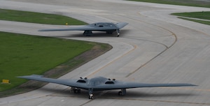 B-2 Spirit stealth bombers assigned to the 509th Bomb Wing taxi on the runway at Whiteman Air Force Base, Mo., April 15, 2024. Team Whiteman executed a mass fly-off of 12 B-2s to cap off the annual Spirit Vigilance exercise. Routine training ensures that Airmen are always ready to execute global strike operations… anytime, anywhere. (U.S. Air Force photo by Airman 1st Class Hailey Farrell)