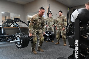 Senior Airman Michael J. Howerton, S4/Vehicle Control Officer assigned to the 42nd Security Forces Squadron trains using Operational Support Team equipment at the new centralized training center during a physical fitness session at Maxwell Air Force Base, Ala. April 22, 2024. This new area is open to all active-duty members from the designated unit who is assigned to the OST and who wants to improve their strength and conditioning, mental health, diet or overall physical well-being. (U.S. Air Force photo by Staff Sgt. Crystal A. Jenkins)