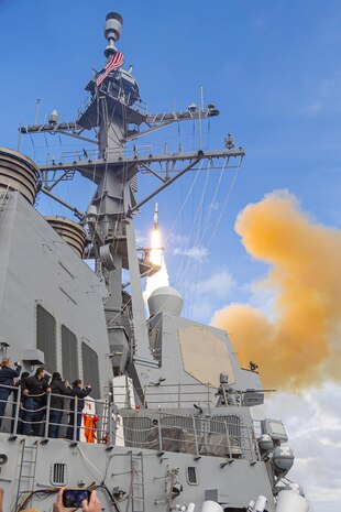 ATLANTIC OCEAN -- Arleigh Burke-class destroyer USS Winston S. Churchill (DDG 81) fires a standard missile (SM-2) during Combat System Ship Qualification Trials (CSSQT) in the Atlantic Ocean on Feb.18, 2024. The crew's successful intercept of an air target with a missile (SM-2) is a first for a ship running a virtualized Aegis Combat System. This milestone, achieved during the ship's final phase of CSSQT, marks a significant contribution to the Navy's wider effort to field a single integrated combat system to surface ships. (U.S. Navy Photo)