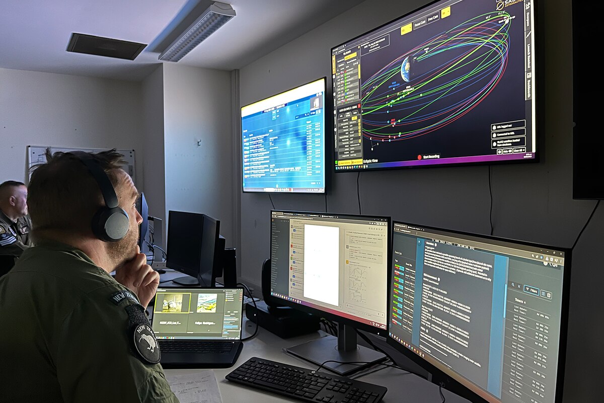 A member of a foreign military looks at a computer terminal.