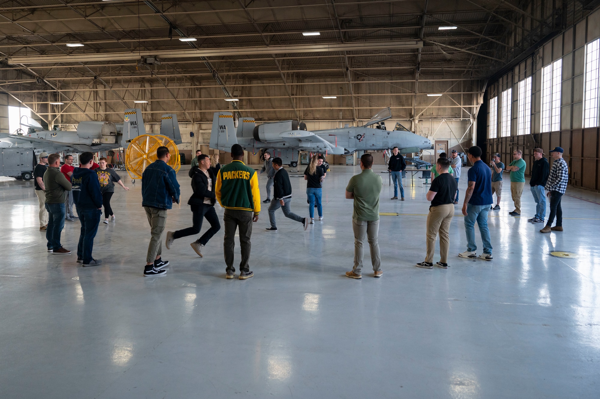 U.S. Air Force Airmen assigned to the 757th Aircraft Maintenance Squadron participate in an icebreaker exercise during Mindful Maintainer Day at Nellis Air Force Base, Nevada, March 28, 2024.