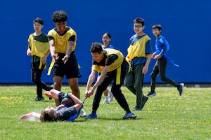 A player gets his flag pulled by an opponent.