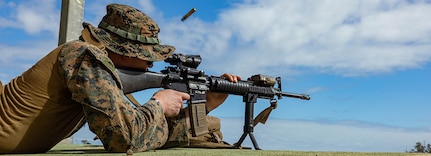 240423-M-IP954-1264 ROBERTSON BARRACKS, NT, Australia (April 23, 2024) U.S. Marine Corps Sgt. Gabriel Guzman, a platoon sergeant with Combat Logistics Battalion 5 (Reinforced), Marine Rotational Force – Darwin 24.3, fires an M16A4 service rifle during a battlesight zero range at Robertson Barracks, Darwin, NT, Australia, April 23, 2024. A BZO is the elevation and windage settings required to place a single shot, or the center of a shot group, in a predesignated location. MRF-D 24.3 is part of an annual six-month rotational deployment to enhance interoperability with the Australian Defence Force and Allies and partners and provide a forward-postured crisis response force in the Indo-Pacific. Guzman is a native of Illinois. (U.S. Marine Corps photo by Cpl. Juan Torres)