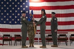 Col. Amy Lewis (left), 340th Flying Training Group commander, presents the 5th Flying Training Squadron command guidon to Lt. Col. Christina Hopper, 5th FTS commander, during the squadron's change of command ceremony at Vance Air Force Base, Oklahoma, on April 18, 2024. As a command pilot who has flown more than 50 combat missions throughout Operations Southern Watch and Iraqi Freedom, Hopper is now responsible for the execution of the Air Education and Training Command / Air Force Reserve Command Associate Instructor Program at Vance, supporting 71st Flying Training Wing operations, conducting nearly 9,000 sorties annually.