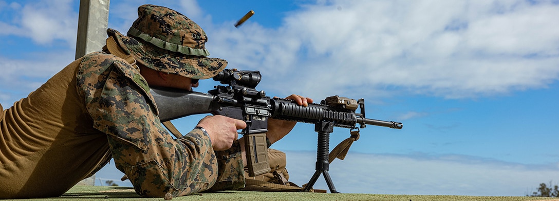 240423-M-IP954-1264 ROBERTSON BARRACKS, NT, Australia (April 23, 2024) U.S. Marine Corps Sgt. Gabriel Guzman, a platoon sergeant with Combat Logistics Battalion 5 (Reinforced), Marine Rotational Force – Darwin 24.3, fires an M16A4 service rifle during a battlesight zero range at Robertson Barracks, Darwin, NT, Australia, April 23, 2024. A BZO is the elevation and windage settings required to place a single shot, or the center of a shot group, in a predesignated location. MRF-D 24.3 is part of an annual six-month rotational deployment to enhance interoperability with the Australian Defence Force and Allies and partners and provide a forward-postured crisis response force in the Indo-Pacific. Guzman is a native of Illinois. (U.S. Marine Corps photo by Cpl. Juan Torres)