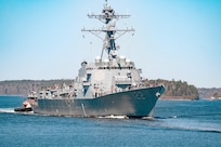 USS John Basilone (DDG 122) transits the Kennebec River to the sea to conduct Bravo Trials.
