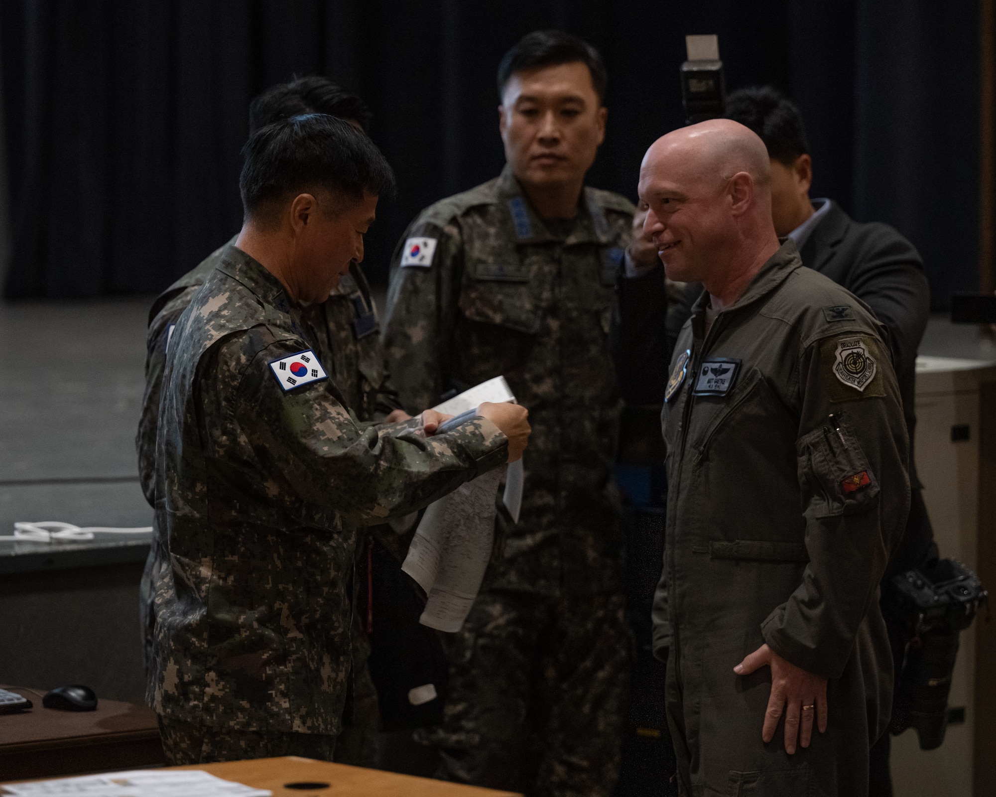 Republic of Korea Air Force Chief of Staff Gen. Lee, Young Su presents a gift to U.S. Air Force Col. Matthew Gaetke, 8th Fighter Wing commander, during his visit to Kunsan Air Base, ROK