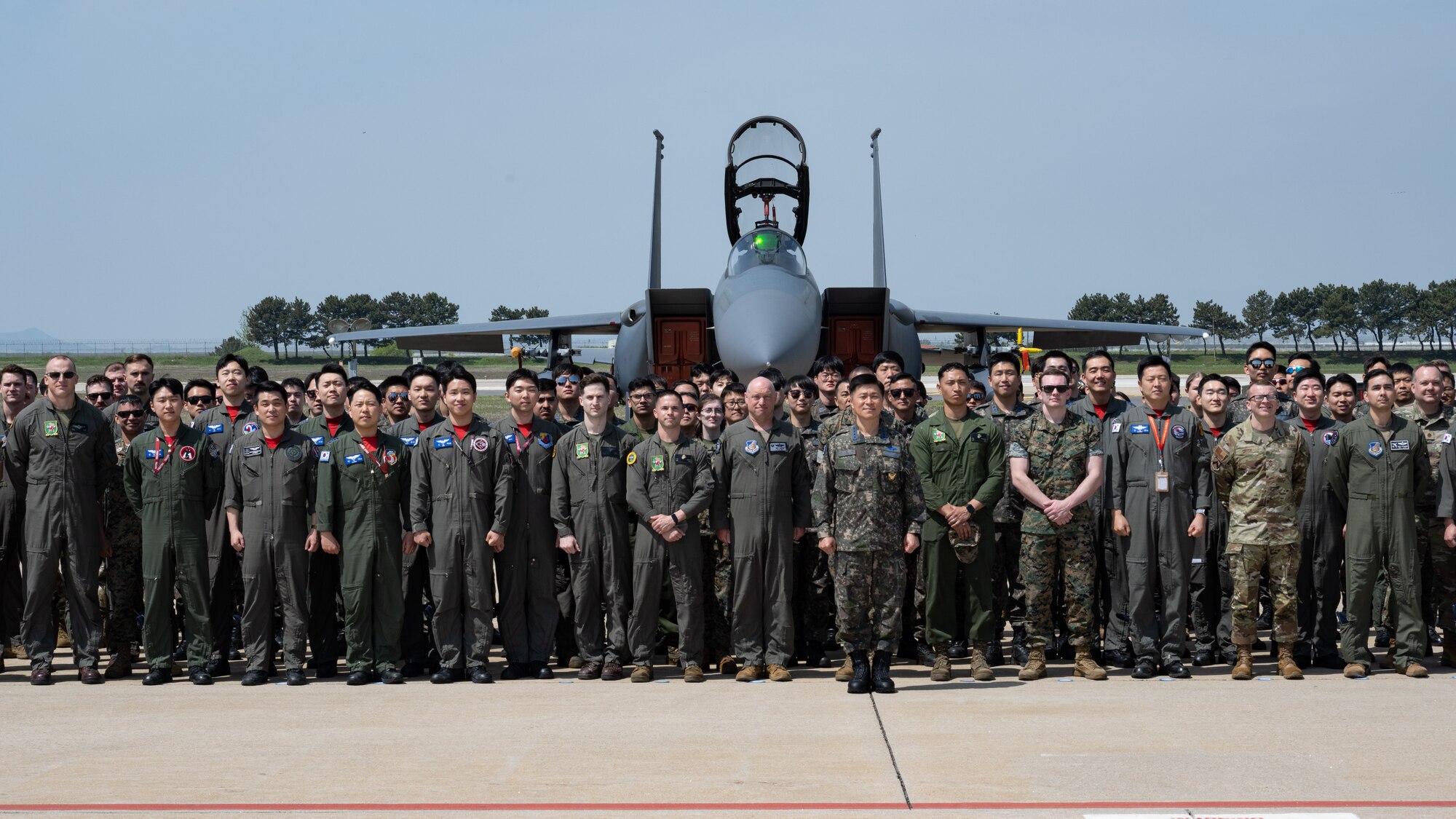Republic of Korea Air Force Chief of Staff Gen. Lee, Young Su takes a group photo with Kunsan Air Base personnel and Korea Flying Training 2024 participants at Kunsan Air Base, ROK