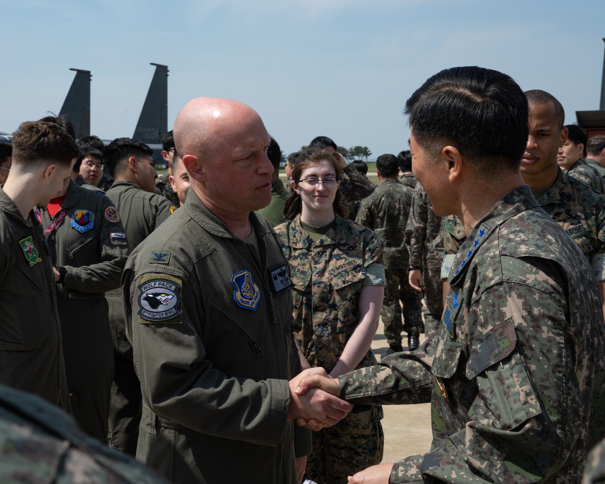 U.S. Air Force Col. Matthew Gaetke, 8th Fighter Wing commander (left), and Republic of Korea Air Force Chief of Staff Gen. Lee, Young Su (right) say their goodbyes after a visit at Kunsan Air Base, ROK