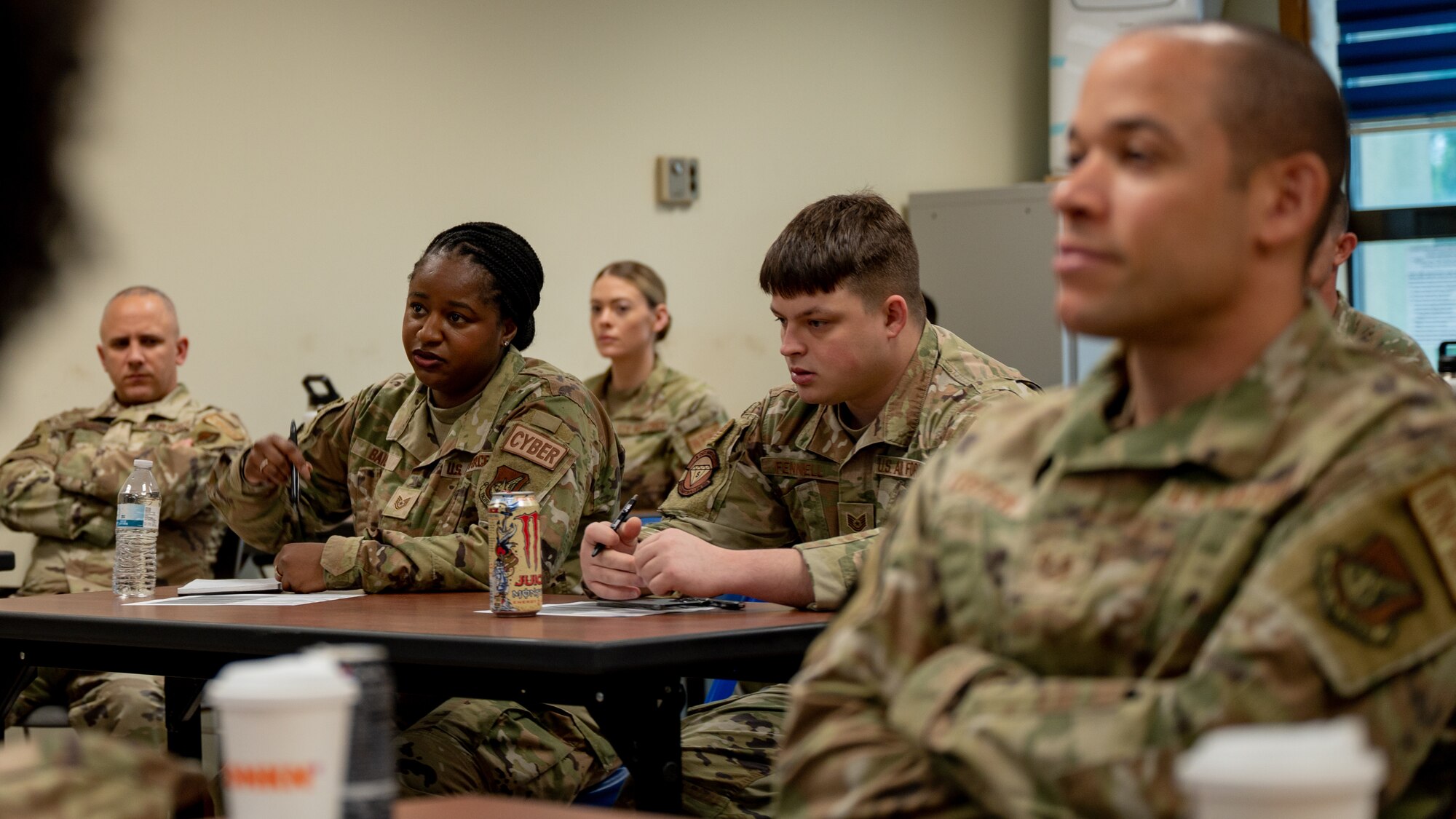 Tech Sgt. Agelyne Baliey explains why she strives to become a shirt during a First Sergeant Symposium.