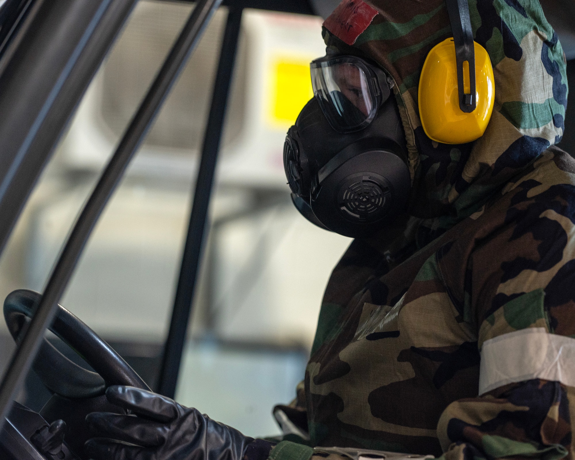 U.S. Air Force Airman from the 133rd Air Transportation Function loaded and secured cargo onto a pallet in their Mission-Oriented Protective Posture (MOPP) gear in St. Paul, Minn., April 5, 2024.