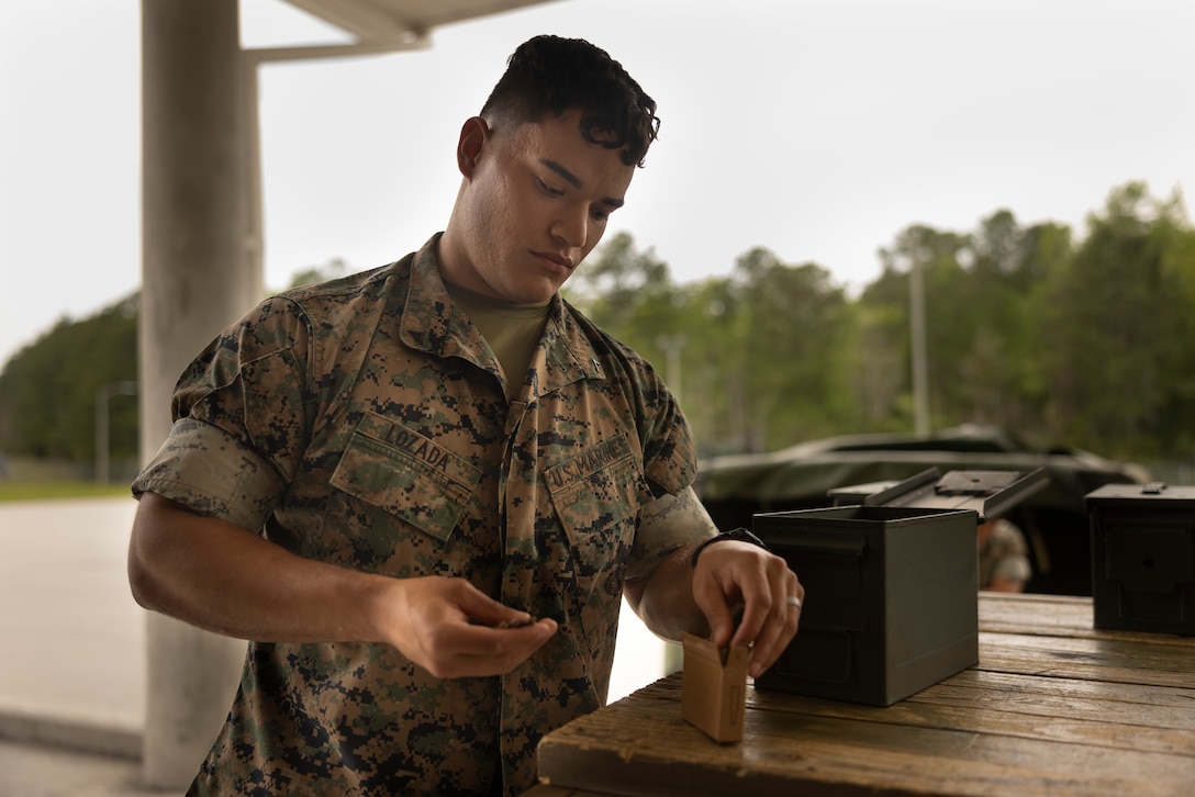 U.S. Marine Corps Lance Cpl. Rafael Lozada, an ammunition technician with Ammunition Company, 2nd Combat Readiness Regiment, 2nd Marine Logistics Group, counts blank ammunition on Camp Lejeune, North Carolina, April 17, 2024. Lozada was selected by his command for his diligence, commitment, and seamless ability to handle a multitude of tasks. Lozada’s accomplishment include completing over 800 issue and turn-in transactions, coupled with conducting more than 150 vehicle inspections, while being praised for high ethics and efficiency. When asked why he joined the Marine Corps Lozada said, “I played football in college for three years prior to joining the military, and a lot of it is similar. In football it is all about having attention to detail, which makes the difference between winning and losing. In the Marine Corps paying attention to the details is even more important because it isn’t just win or lose, it can be life or death.” Each week, 2nd MLG recognizes one outstanding Marine or Sailor that goes above and beyond in their duties and embodies the whole Marine concept. (U.S. Marine Corps photo by Lance Cpl. Jessica J. Mazzamuto)