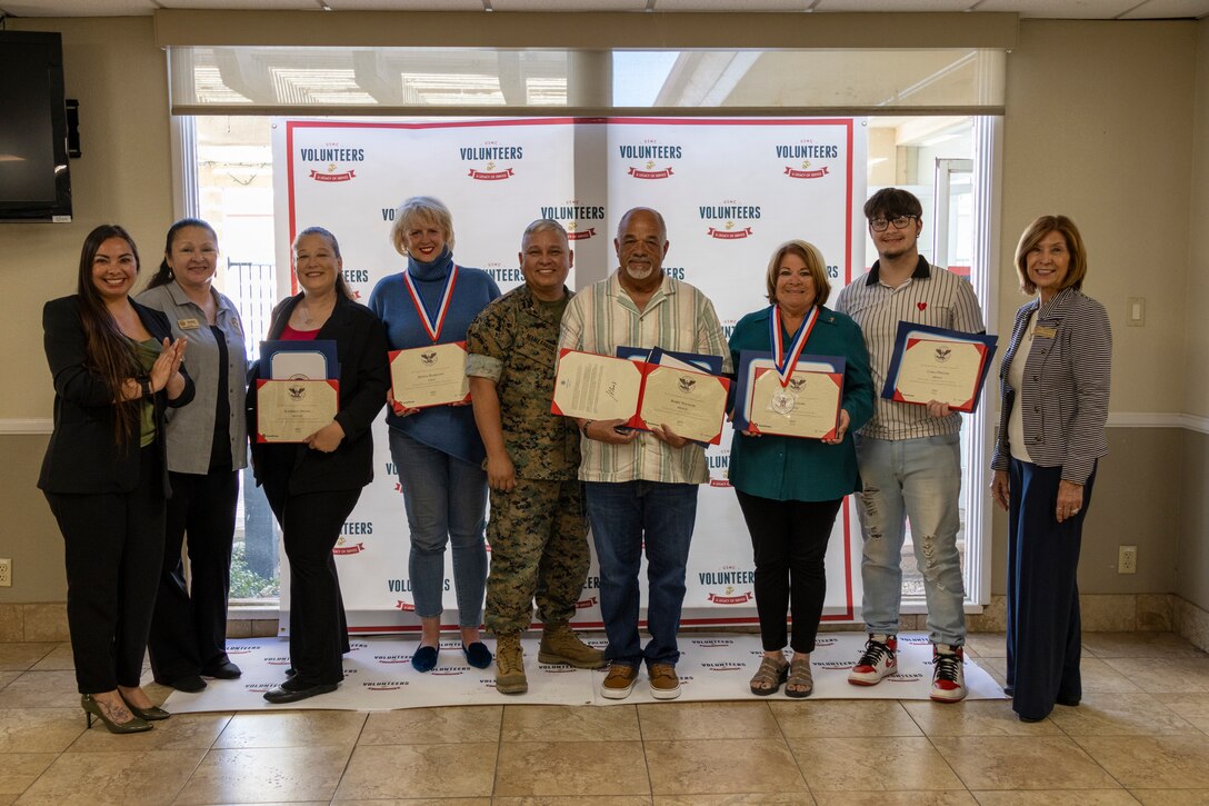 Lt. Col. Aurturo Manzanedo, base executive officer, Beth Simpson, MFP trainer, and Albert "AJ" Jacobs, SMP Coordinator, recognize volunteers during an appreciation ceremony at Maj. James L. Day Conference Center aboard Marine Corps Logistics Base (MCLB)  - Barstow on April 24, 2024. Our volunteers graciously and generously dedicate their time to ensuring support for programs, events, and so much more. Thank you volunteers for all you do!