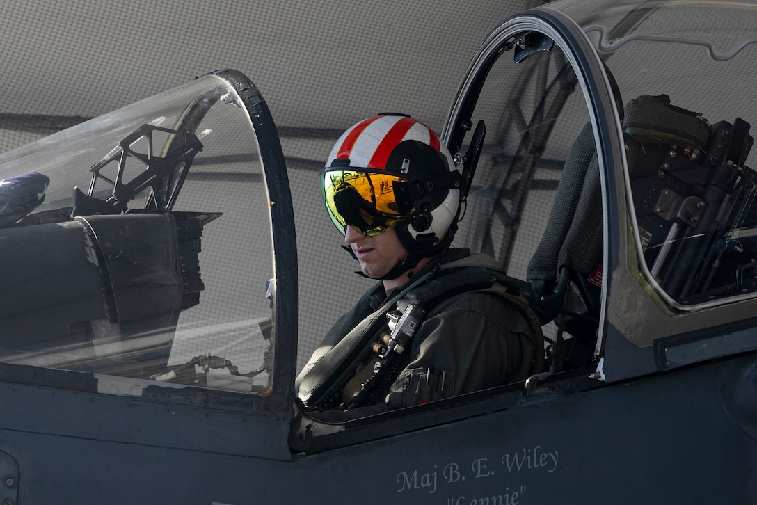 U.S. Marine Corps Capt. Raymond Hower, a native of California and an AV-8B Harrier II jet pilot with Marine Attack Squadron (VMA) 223, conducts preflight checks prior to a flight honoring his great-uncle Louis A. Conter at Marine Corps Air Station Cherry Point, North Carolina, April 18, 2024. Conter was the last known survivor of the USS Arizona during the attack on Pearl Harbor in 1941 and passed away April 1, 2024. Hower flew U.S. flags and Conter's naval aviator wing insignia during the flight. Conter served in the U.S. Navy from 1939 to 1967. (U.S. Marine Corps photo by Lance Cpl. Orlanys Diaz Figueroa)