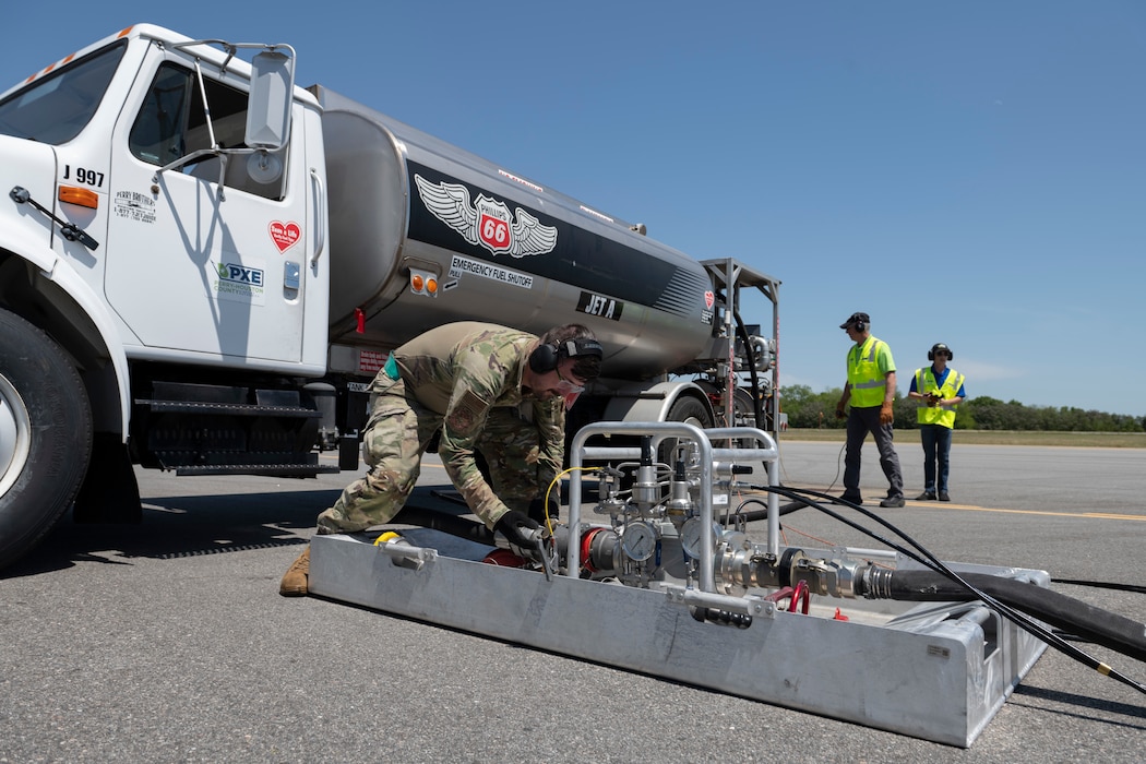 U.S. Air Force Senior Airman Chad Tidwell, 23rd Logistics Readiness Squadron fuels distribution supervisor, hooks a fuel hose to a Versatile Integrating Partner Equipment Refueling kit at Perry-Houston County Airport, Georgia, April 12, 2024. Tidwell supported refueling operations during Exercise Ready Tiger 24-1 at one of two contingency locations established for Agile Combat Employment. During Ready Tiger 24-1, the 23rd Wing will be evaluated on the integration of Air Force Force Generation principles such as Agile Combat Employment, integrated combat turns, forward aerial refueling points, multi-capable Airmen, and combat search and rescue capabilities. (U.S. Air Force photo by Senior Airman Rachel Coates)