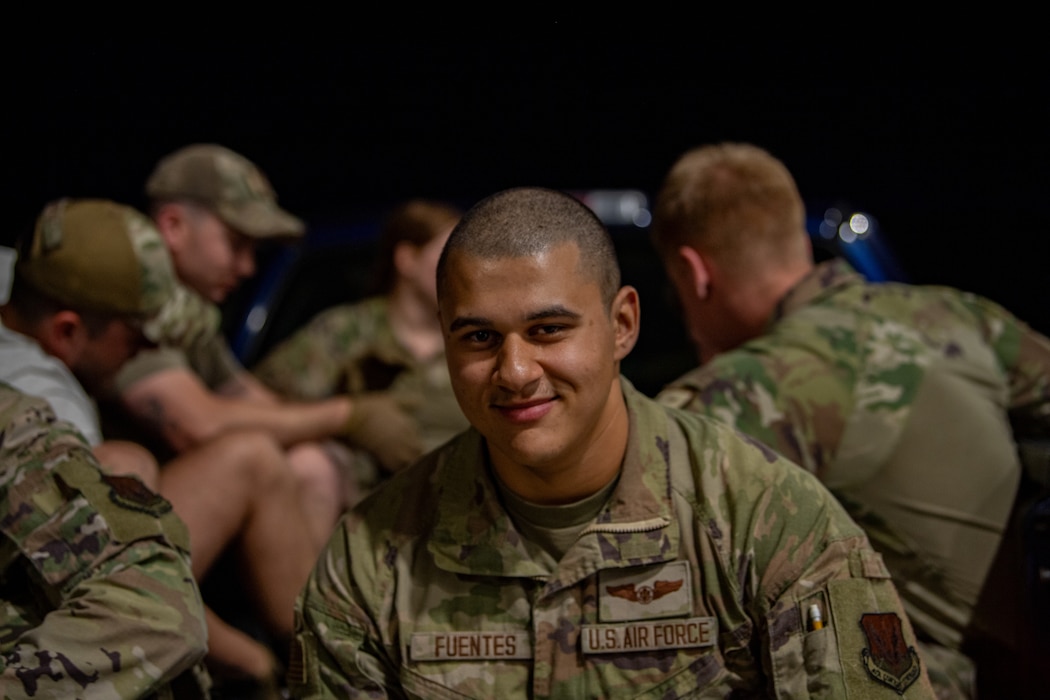 U.S. Air Force Sierra Orozco, 71st Rescue Squadron loadmaster, poses for a photo during Exercise Ready Tiger 24-1 at Savannah Air National Guard Base, Georgia, April 13, 2024. During Ready Tiger 24-1, exercise inspectors will assess the 23rd Wing's proficiency in employing decentralized command and control to fulfill air tasking orders across geographically dispersed areas amid communication challenges, integrating Agile Combat Employment principles such as integrated combat turns, forward aerial refueling points, multi-capable Airmen, and combat search and rescue capabilities. (U.S. Air Force photo by Senior Airman Courtney Sebastianelli)