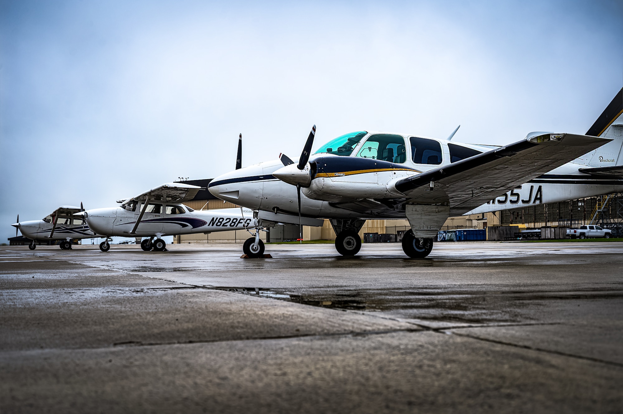 Multiple Cessna 172 aircraft park on the flight line at Joint Base McGuire-Dix-Lakehurst, N.J., April 20, 2024. The Mid-Air Collision Avoidance program is designed to ensure safety practices are observed between military and civilian pilots who share a common airspace. (U.S. Air Force photo by Senior Airman Matt Porter)