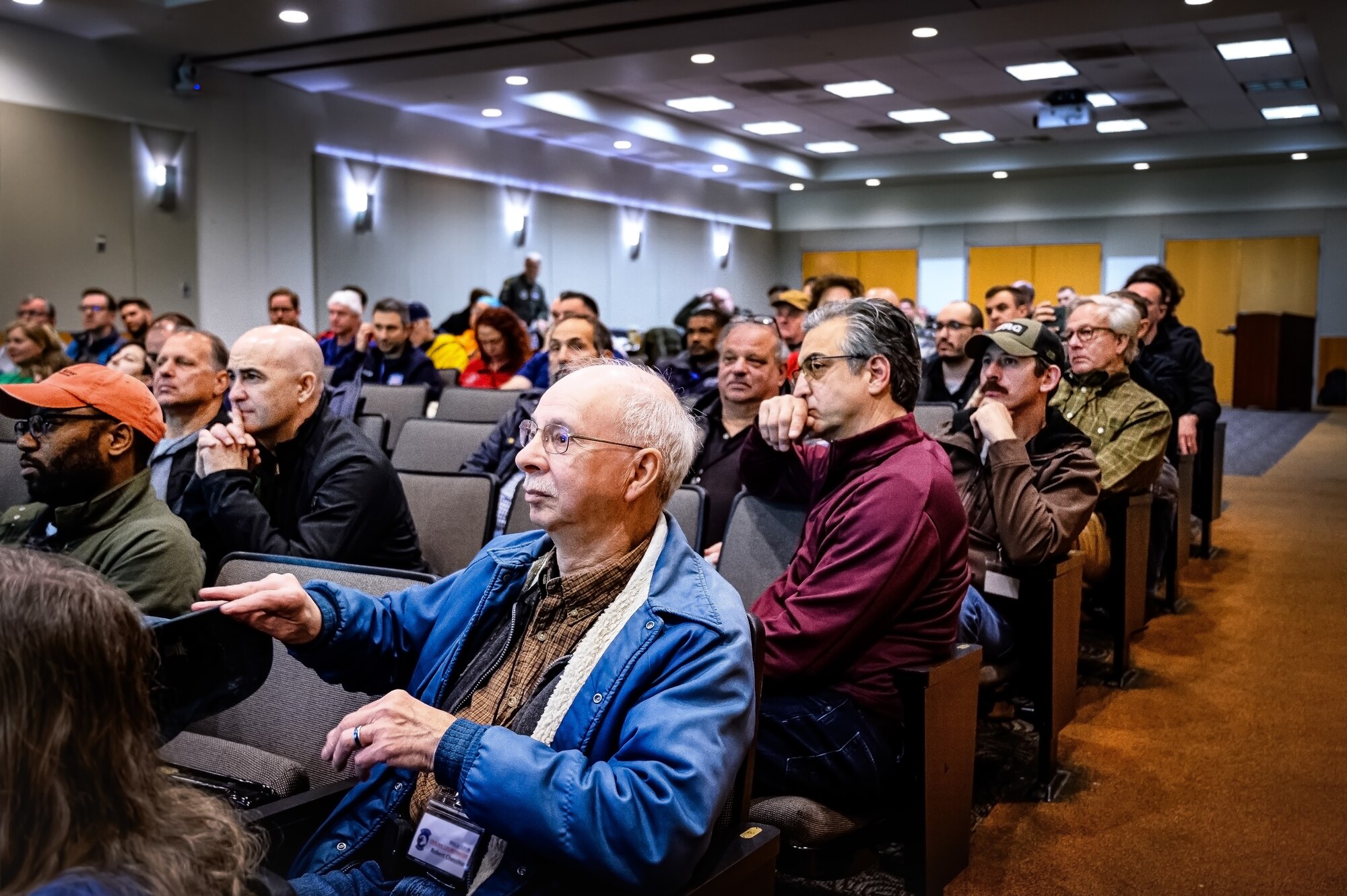 Local civilians attend a safety briefing at Joint Base McGuire-Dix-Lakehurst, N.J., April 20, 2024. The Mid-Air Collision Avoidance program is designed to ensure safety practices are observed between military and civilian pilots who share a common airspace. (U.S. Air Force photo by Senior Airman Matt Porter)