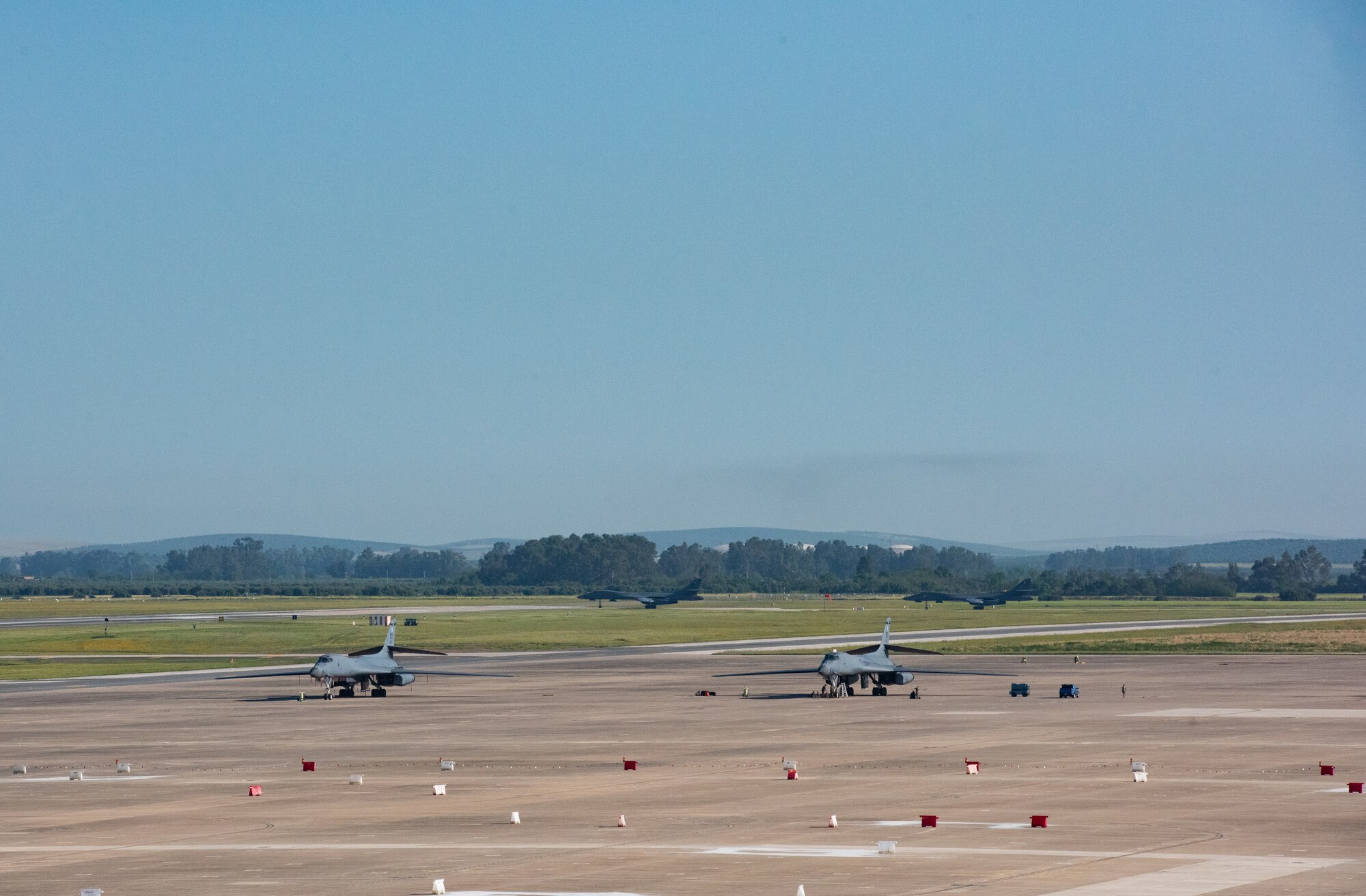 Two U.S. Air Force B-1B Lancers taxi before taking off at Morón Air Base