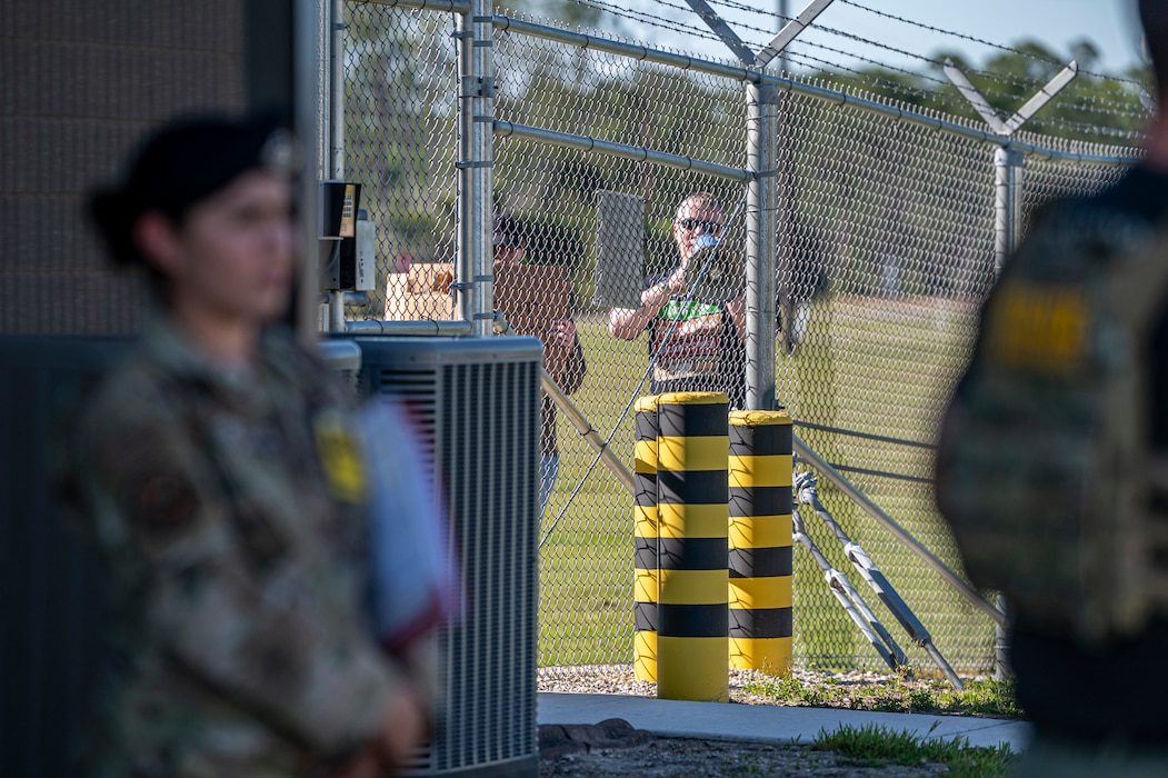 U.S. Air Force Airmen assigned to the 23rd Wing inspection team simulate a protest during Exercise Ready Tiger 24-1 at Avon Park Air Force Range, Florida, April 12, 2024. A second simulated protest tested the base defenders response to potentially escalating unrest. Ready Tiger 24-1 is a readiness exercise demonstrating the 23rd Wing’s ability to plan, prepare and execute operations and maintenance to project air power in contested and dispersed locations, defending the United States’ interests and allies. (U.S. Air Force photo by Airman 1st Class Leonid Soubbotine)
