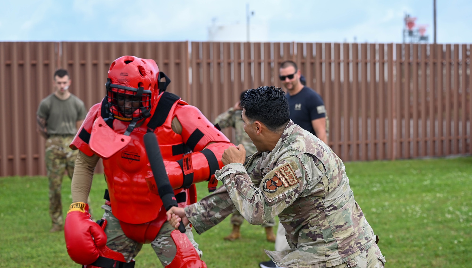 U.S. Air Force personnel spar with the "Red Man" during Warrior Day as part of LEAD-a-Thon at Keesler Air Force base, Mississippi, April 19, 2024.