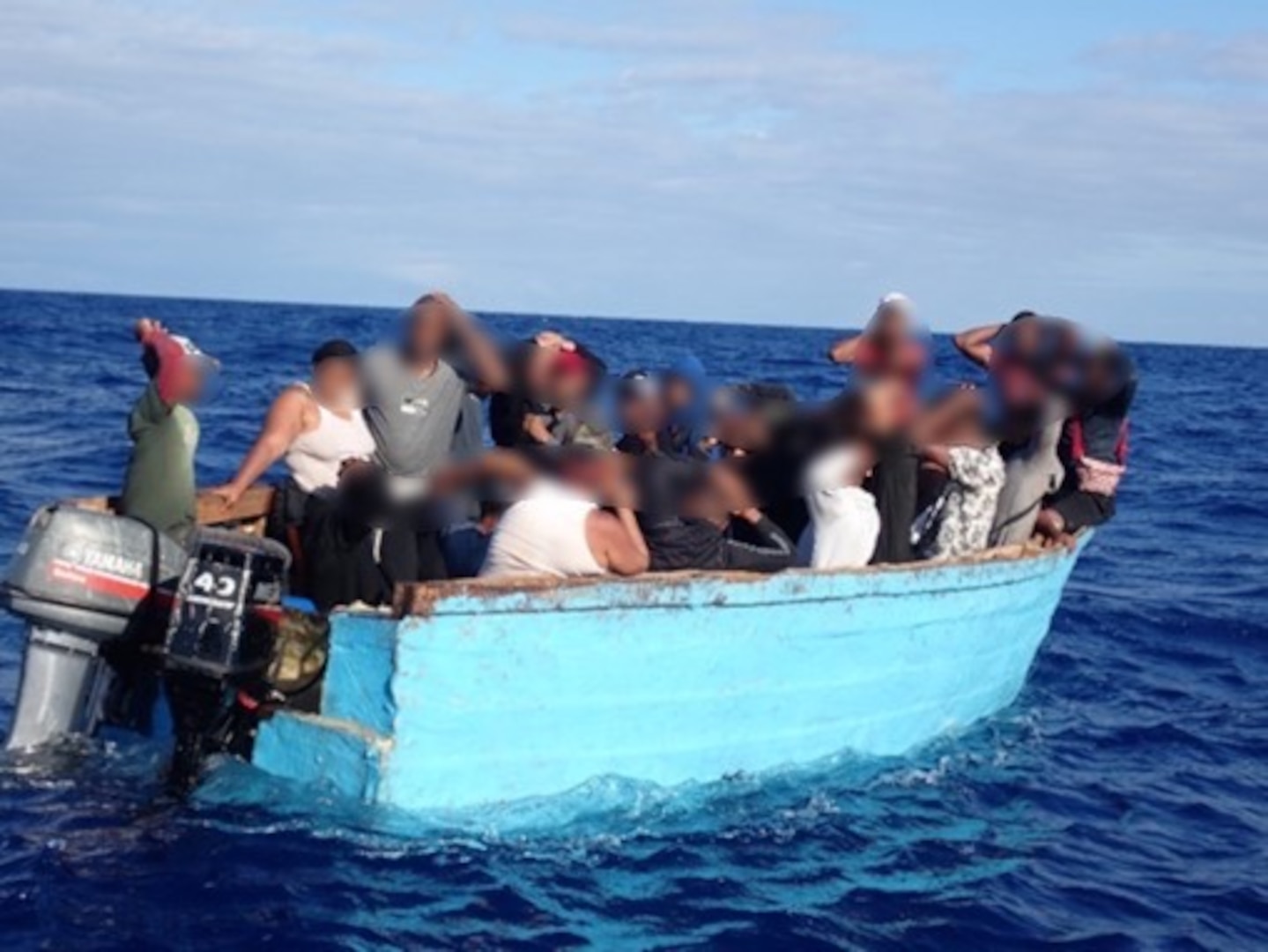 Coast Guard Cutter Winslow Griesser interdicts an unlawful migration voyage in Mona Passage waters April 22, 2024.  The Coast Guard Cutter Heriberto Hernandez returned 27 migrants interdicted in this group, along with a group of 13 migrants from a separate interdiction, to Dominican Republic, April 24, 2024. (U.S. Coast Guard photo)