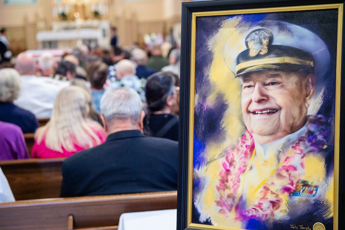 Grass Valley, Calif., (April 23, 2024) A painting of retired Lt. Cmdr. Louis (Lou) Conter is displayed during his memorial service at the St. Patrick Catholic Church. Conter was 102 when he passed away peacefully in his home. In addition to being the last living USS Arizona survivor, Conter also flew more than 200 missions in the South Pacific and survived being shot down twice. (U.S. Navy photo by Chief Mass Communication Specialist John Pearl)