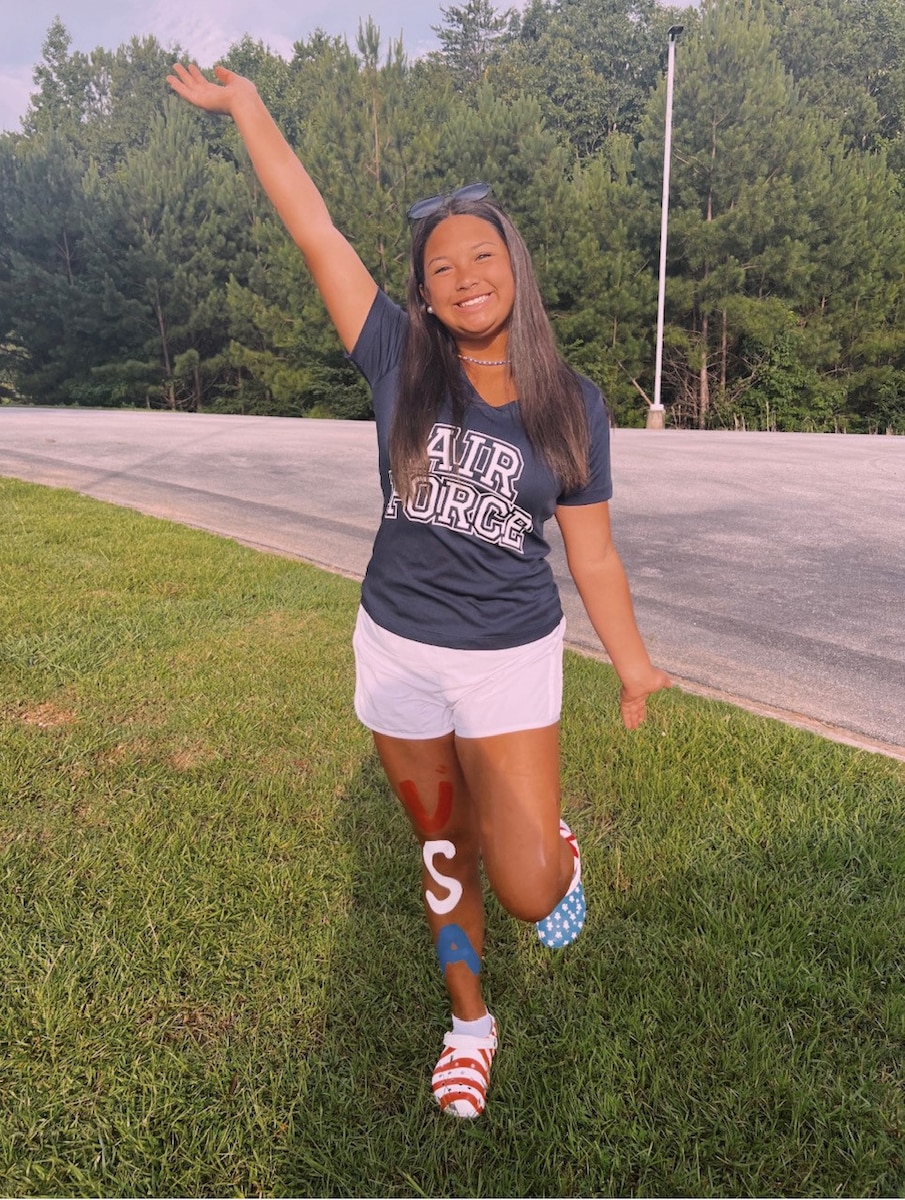 Image of a person posing for a photo.
